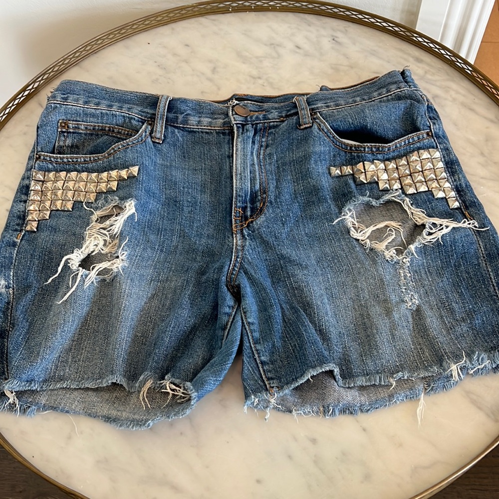 DENIM BDG boyfriend shorts embellished with silver grommets. Size 31.